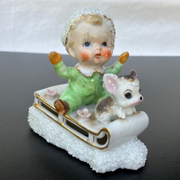 UCAGCO Japan Porcelain Sugared Sledding Boy with Puppy Figurine - Picture 1 of 12